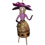 Soffieria De Carlini, Lady in Lavender Shirt & Hat, Gold Skirt